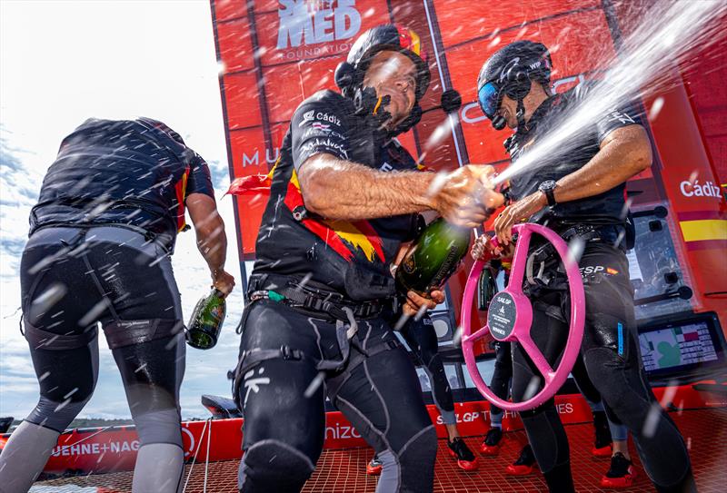 Spain SailGP Team helmed by Diego Botin spray Barons De Rothschild Champagne on board their F50 catamaran as they celebrate winning the Apex Group Bermuda Sail Grand Prix photo copyright Felix Diemer for SailGP taken at  and featuring the F50 class