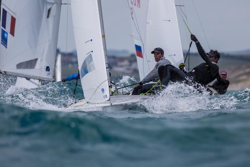 Mat Belcher and Will Ryan on day two of the ISAF Sailing World Cup Weymouth photo copyright Beau Outteridge taken at Weymouth & Portland Sailing Academy and featuring the 470 class