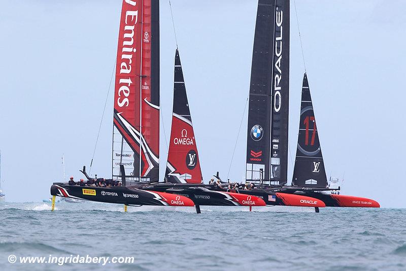 Tight racing between ORACLE TEAM USA and Emirates Team New Zealand on day 3 of the 35th America's Cup Match photo copyright Ingrid Abery / www.ingridabery.com taken at  and featuring the AC50 class