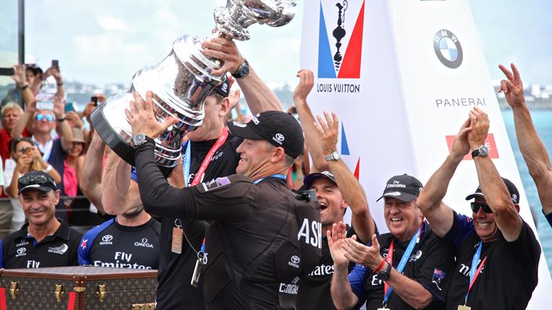 Skipper Glenn Ashby along with helmsman Peter Burling uplifts the America's Cup for the first time in Bermuda photo copyright Richard Gladwell taken at  and featuring the AC50 class