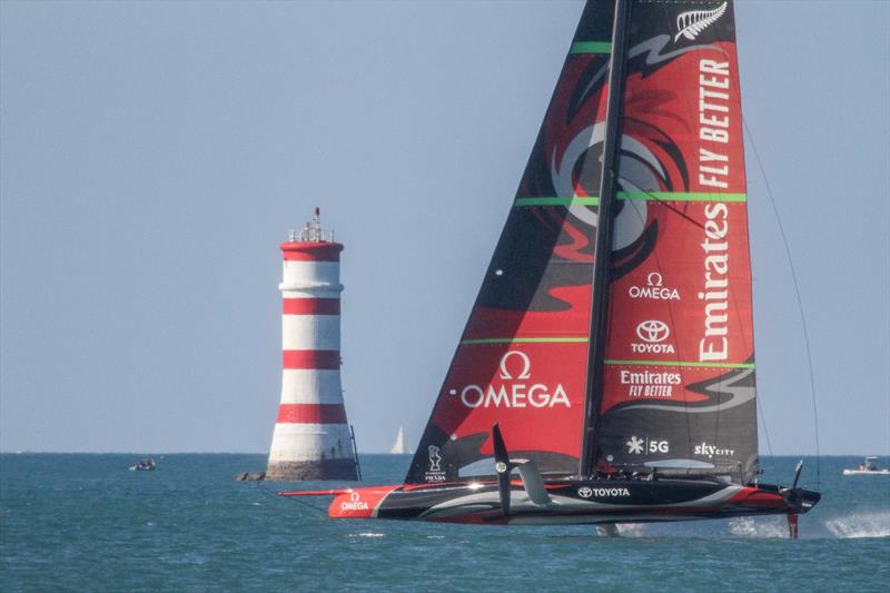 Emirates Team New Zealand AC75 passes Rangitoto Beacon during a downwind run - October 12, 2019 photo copyright Richard Gladwell taken at Royal New Zealand Yacht Squadron and featuring the AC75 class