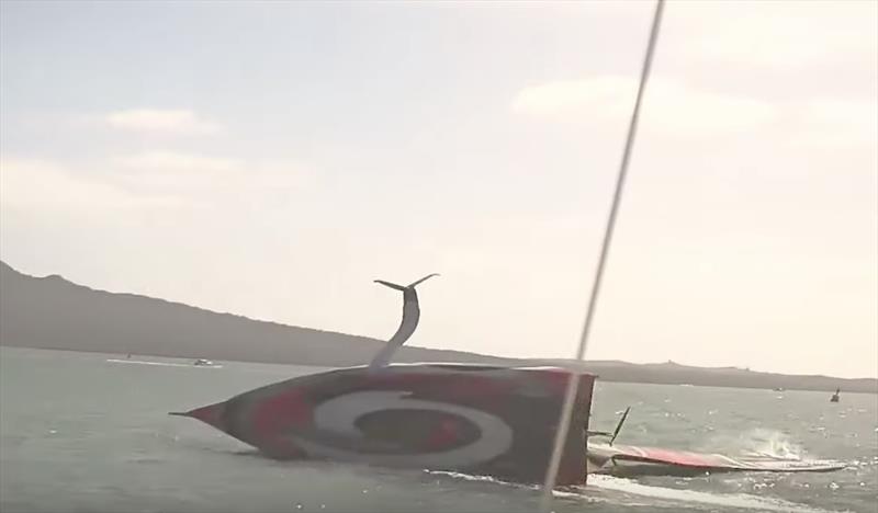 Capsize complete with the AC75 lying as designed with her mast in the water and not going into a full inversion - Emirates Team New Zealand AC75, Te Aihe, capsize - December 19, 2019 - photo © Emirates Team New Zealand