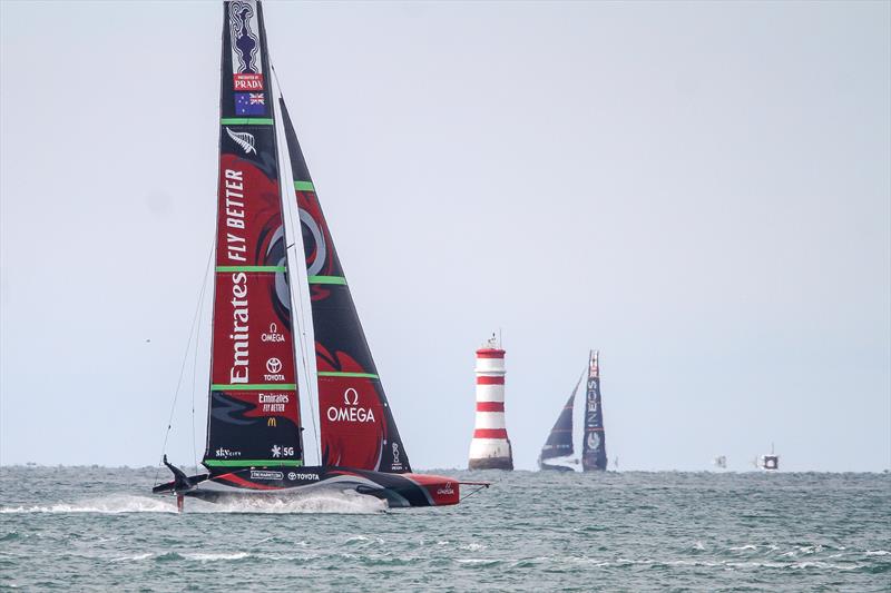 Te Rehutai with Britannia partially obscured by haze out to sea - November 23, 2020 - Waitemata Harbour - America's Cup 36 photo copyright Richard Gladwell / Sail-World.com taken at Royal New Zealand Yacht Squadron and featuring the AC75 class