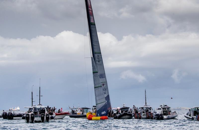 A huge collective effort by American Magic, Emirates Team New Zealand, INEOS Team UK, Luna Rossa Prada Pirelli, and numerous local authorities to save PATRIOT after her damaging crash on the final leg of her race photo copyright Sailing Energy / American Magic taken at  and featuring the AC75 class