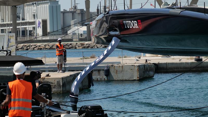 Alinghi Red Bull Racing lowered into the water in Barcelona ahead of another towing test - August 2022 photo copyright Alinghi Red Bull Racing taken at Société Nautique de Genève and featuring the AC75 class
