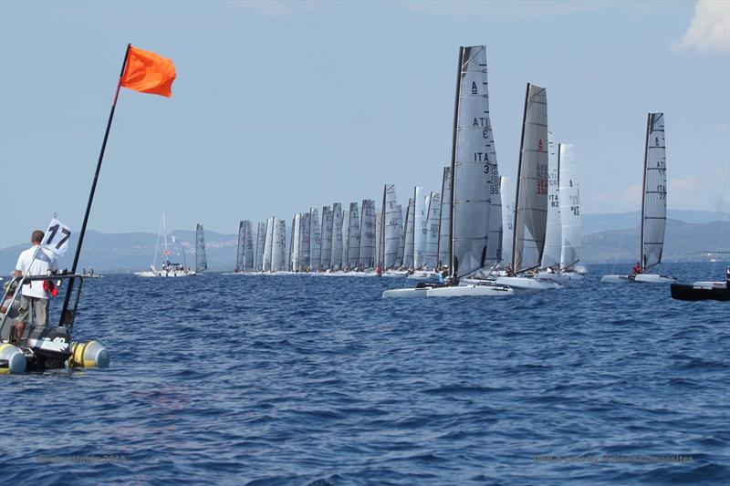 The Race Officer finally gets the fleet away on the third attempt on the final day of the A Class Cat Worlds at Punta Ala photo copyright Gordon Upton taken at Centro Velico Punta Ala and featuring the A Class Catamaran class