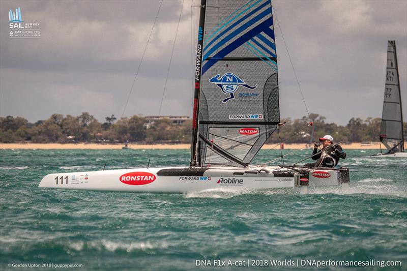 Glenn Ashby heads back to the beach at pace - A-Cat World Championship 2018 - Day 1 photo copyright Gordon Upton / www.guppypix.com taken at Hervey Bay Sailing Club and featuring the A Class Catamaran class