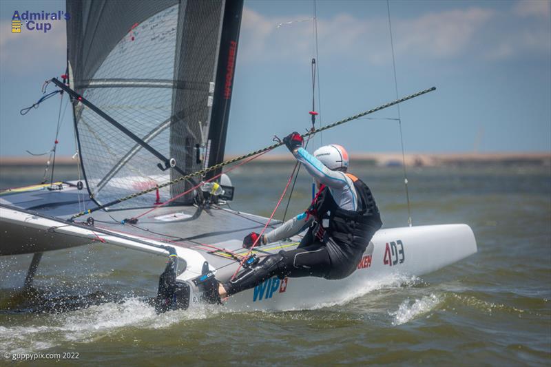 Stevie Brewin carefully selects his control line before the devil's ride of the downwind leg during the A Cat Admiral's Cup 2022 photo copyright Gordon Upton / www.guppypix.com taken at Houston Yacht Club and featuring the A Class Catamaran class