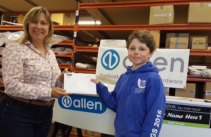 Allen Brothers MD, Liz Adams hands over the official measurement papers for the Allen Academy Optimist to 11 year old Nick Evans from Colchester - photo © Jeremy Nicholson