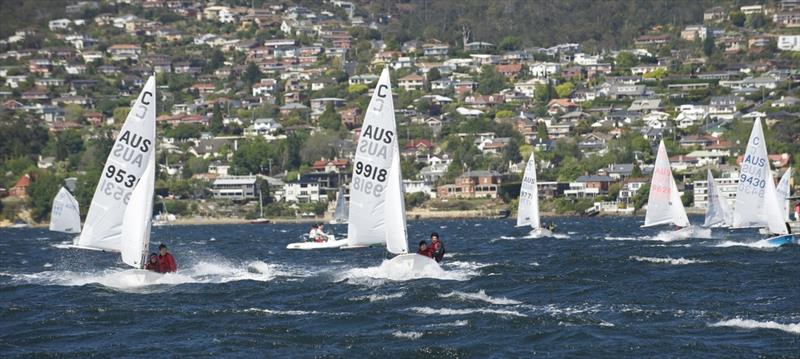 Cadets reaching downwind in a fresh breeze on the River Derwent photo copyright Peter Campbell taken at Royal Yacht Club of Tasmania and featuring the Cadet class