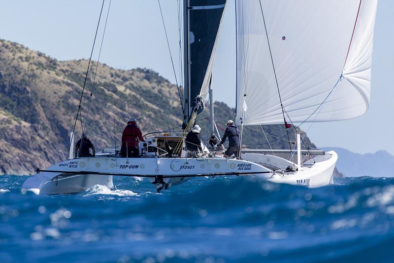 Top Gun in top gear at 2019 Airlie Beach RW - SeaLink Magnetic Island Race Week photo copyright Andrea Francolini taken at Townsville Yacht Club and featuring the Catamaran class