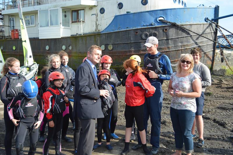  Lion's Vice-President Steve Morris, cadet trainer Ronnie Carter & cadet co-ordinator Phillippa Smerdon with club members appreciating their new Crewsaver buoyancy aids photo copyright George Dalley taken at Torpoint Mosquito Sailing Club and featuring the Dinghy class