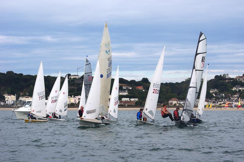 Dinghy Class 8 start at the Carey Olsen Jersey Regatta 2019 photo copyright Simon Ropert taken at Royal Channel Islands Yacht Club and featuring the Dinghy class