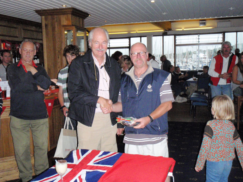 Donald Mackenzie at the prize giving with Simon Ward who won Dinghy Class 2 during Lymington Week photo copyright Ali Husband taken at Royal Lymington Yacht Club and featuring the Dinghy class