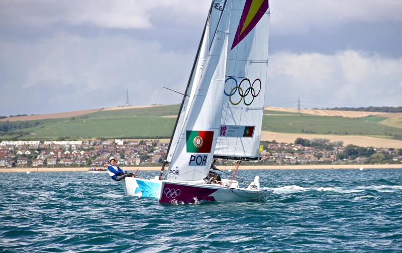 Racing off the beach opposite the 2012 Olympic Regatta venue on Weymouth Bay. A Sailing Venue with a Beach Hub and Marina Hub is not practical because of the distances and travel time involved. - photo © Richard Gladwell