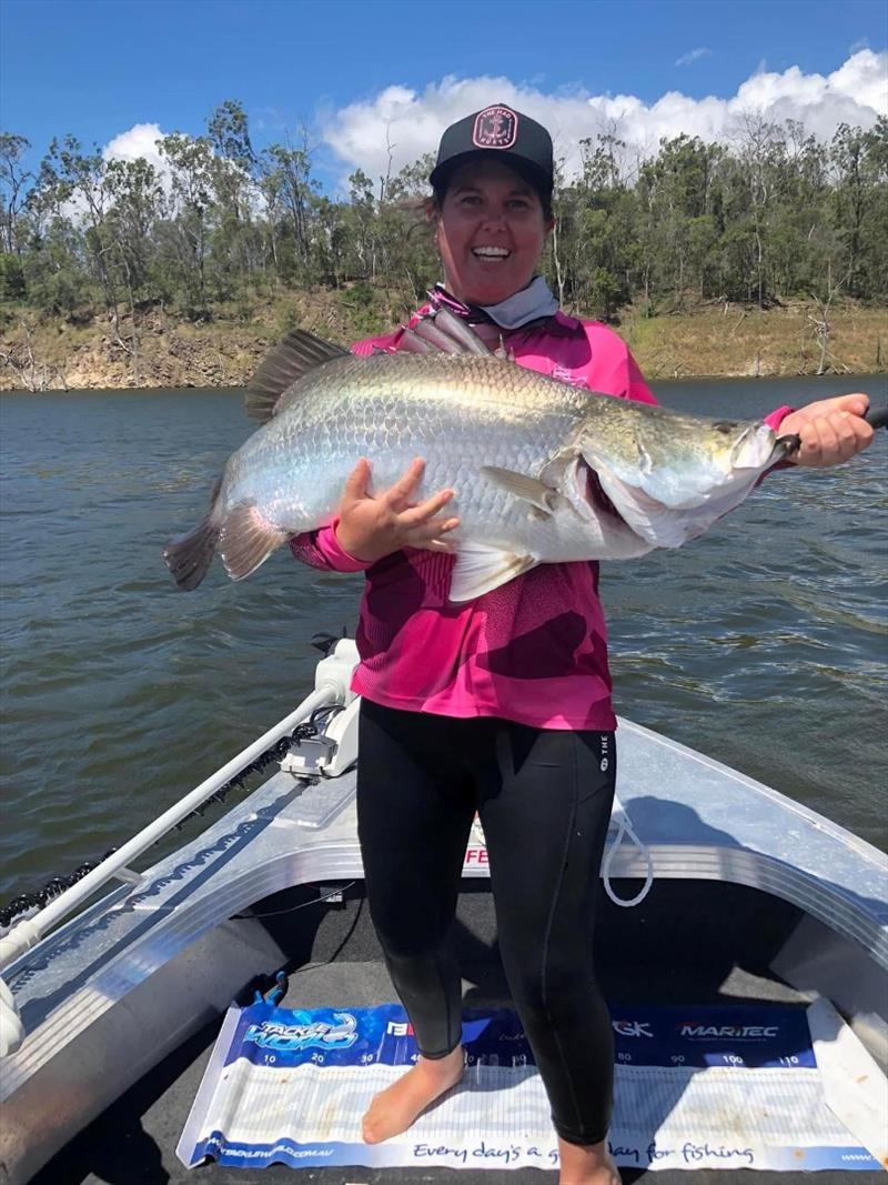 Kristie with a nice barra and bass from a trip to Lake Monduran photo copyright Fisho's Tackle World taken at  and featuring the Environment class