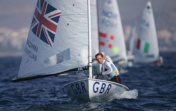  Laura Baldwin (GBR) in action in the women's single handed dinghy Europe Finals race - 2004 Olympic Regatta photo copyright Clive Mason / Getty Images taken at  and featuring the Europe class