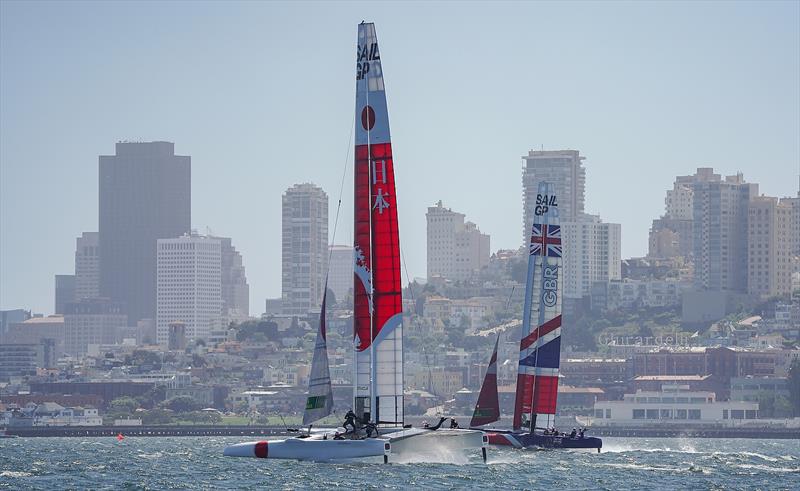 Great Britain SailGP Team skippered by Dylan Fletcher and Japan SailGP Team skippered by Nathan Outteridge raining on choppy waters in the bay. Race 2 Season 1 SailGP event in San Francisco, California,  - photo © Beau Outteridge for SailGP