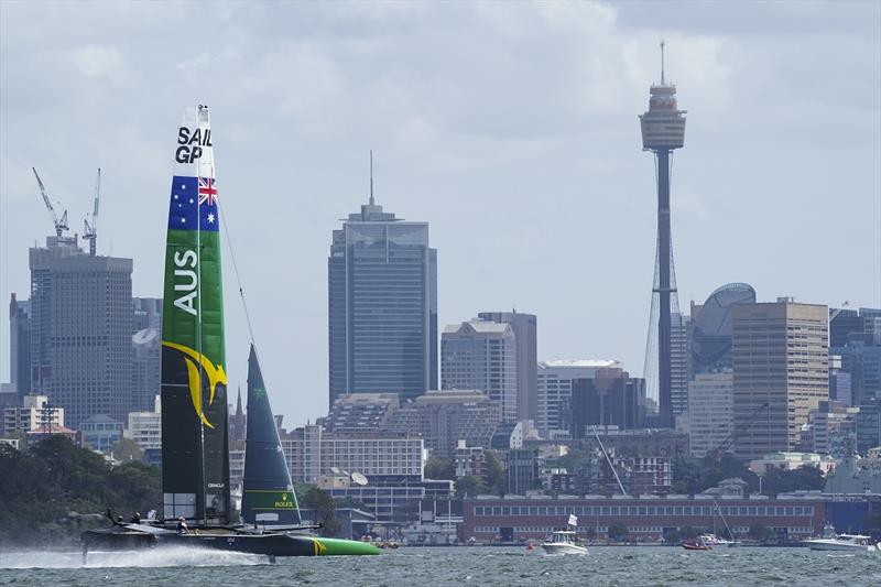 Australia SailGP Team helmed by Tom Slingsby sails past Sydney Tower as they warm up before the first race on Race Day 1 - Sydney SailGP photo copyright Bob Martin for SailGP taken at  and featuring the F50 class