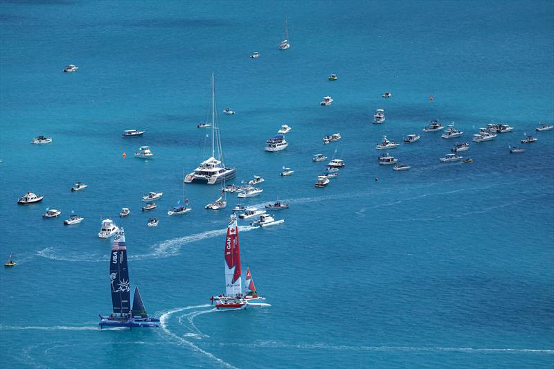 USA SailGP Team helmed by Jimmy Spithill and Canada SailGP Team helmed by Phil Robertson sail past the spectator boats on Race Day 2 of Bermuda SailGP presented by Hamilton Princess, Season 3, in Bermuda photo copyright Simon Bruty for SailGP taken at  and featuring the F50 class