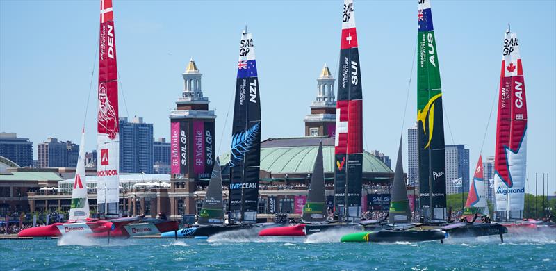 The fleet sail past spectators at Navy Pier on Race Day 1 of the T-Mobile United States Sail Grand Prix | Chicago at Navy Pier photo copyright Bob Martin for SailGP taken at  and featuring the F50 class