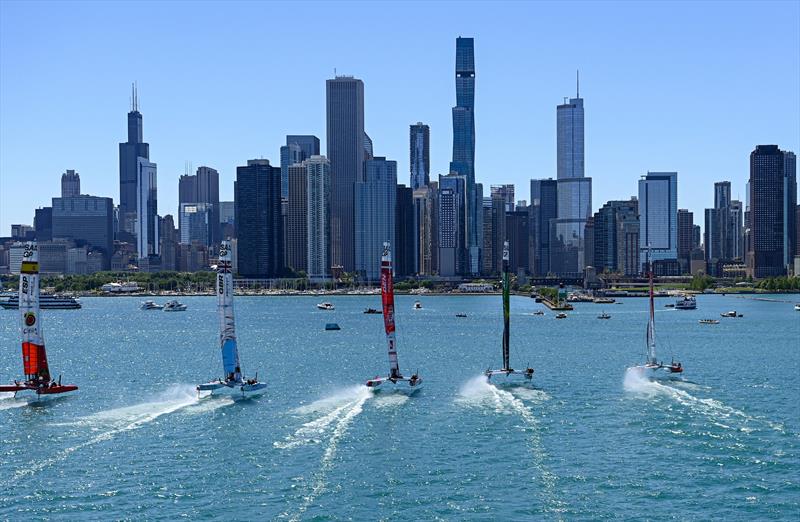 The SailGP F50 catamaran fleet sail towards the Chicago skyline on Race Day 1 of the T-Mobile United States Sail Grand Prix | Chicago at Navy Pier photo copyright Jon Buckle for SailGP taken at  and featuring the F50 class