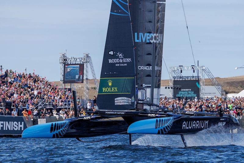 New Zealand SailGP Team helmed by Peter Burling cross the finish line as they race past the Fan Village in race 2 on Race Day 2 of the ROCKWOOL Denmark Sail Grand Prix in Copenhagen, Denmark photo copyright Felix Diemer for SailGP taken at  and featuring the F50 class