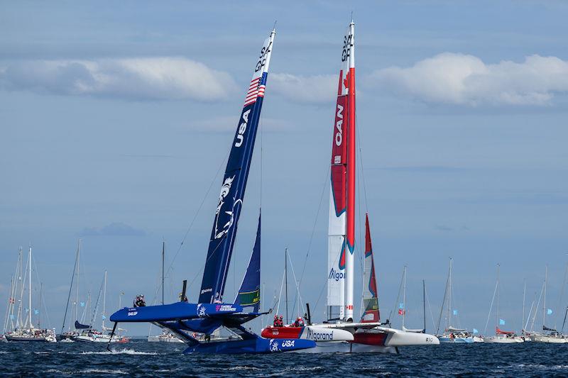 USA SailGP Team helmed by Jimmy Spithill and Canada SailGP Team helmed by Phil Robertson on Race Day 2 of the ROCKWOOL Denmark Sail Grand Prix in Copenhagen, Denmark photo copyright Jon Buckle for SailGP taken at  and featuring the F50 class