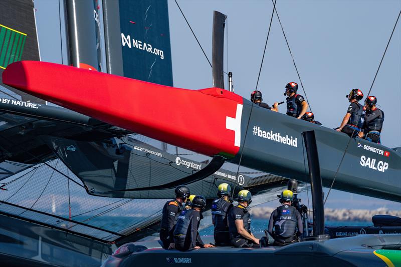 The F50 catamaran of Switzerland SailGP Team helmed by Sebastien Schneiter lifts up over Australia SailGP Team helmed by Tom Slingsby ahead of the Spain Sail Grand Prix in Cadiz, Andalusia, Spain photo copyright Bob Martin for SailGP taken at  and featuring the F50 class