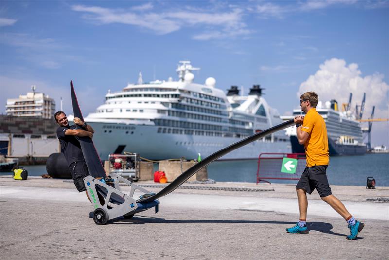 Members of the Great Britain SailGP shore team move their foils across the Technical Base ahead of the Spain Sail Grand Prix in Cadiz, Andalusia, Spain. 21st September  photo copyright Ian Walton/SailGP taken at Real Club Náutico de Cádiz and featuring the F50 class