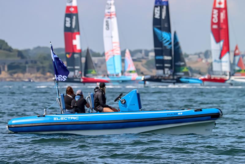 RS Electric Pulse with SailGP competitors in background photo copyright RS Electric Boats taken at  and featuring the F50 class