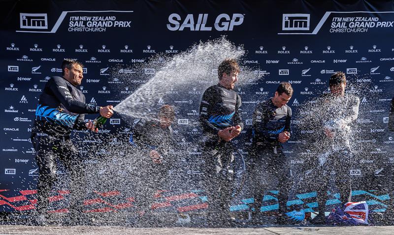 Peter Burling, Co-CEO and driver of New Zealand SailGP Team, and his crew spray Barons De Rothschild Champagne on each other as they celebrate winning the ITM New Zealand Sail Grand Prix in Christchurch, New Zealand. Sunday 24th March  photo copyright Brett Phibbs/SailGP taken at Naval Point Club Lyttelton and featuring the F50 class
