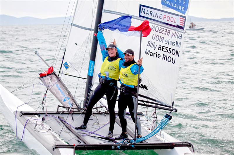 Nacra 17 gold for Besson & Riou at ISAF Sailing World Cup Hyères photo copyright Christophe Launay / www.sealaunay.com taken at COYCH Hyeres and featuring the Finn class