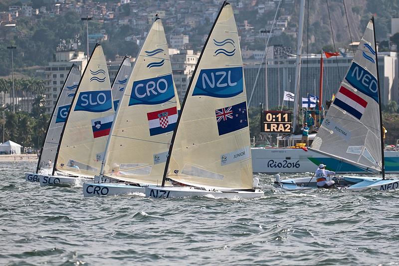Finn class start in Medal race in Rio photo copyright Richard Gladwell taken at  and featuring the Finn class