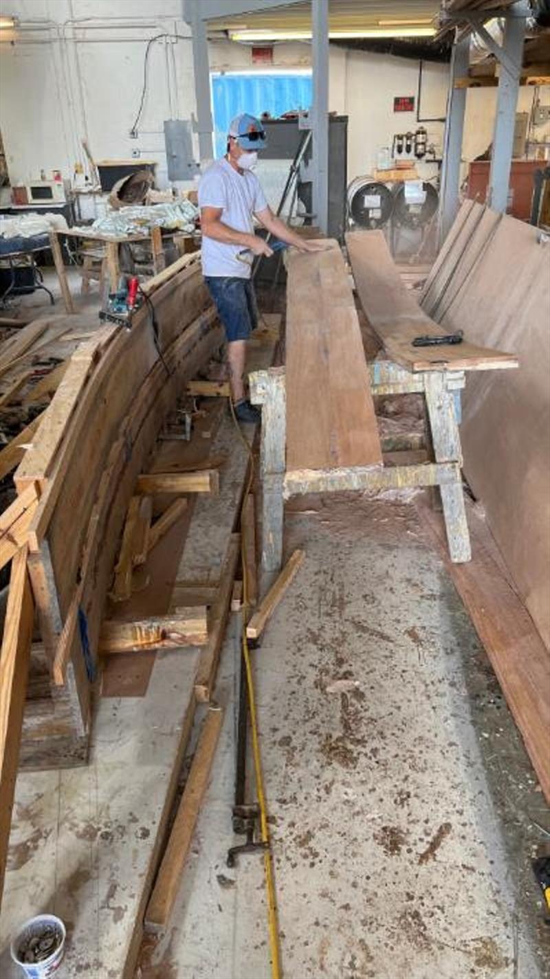 Ricky laminating Hull #8 deck beams photo copyright Michael Rybovich & Sons taken at  and featuring the Fishing boat class