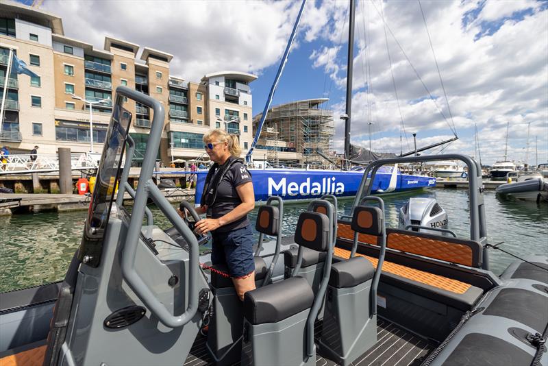 Pip Hare takes control of her Highfield Patrol 760 alongside her IMOCA 60 Medallia photo copyright Highfield Boats taken at  and featuring the Fishing boat class