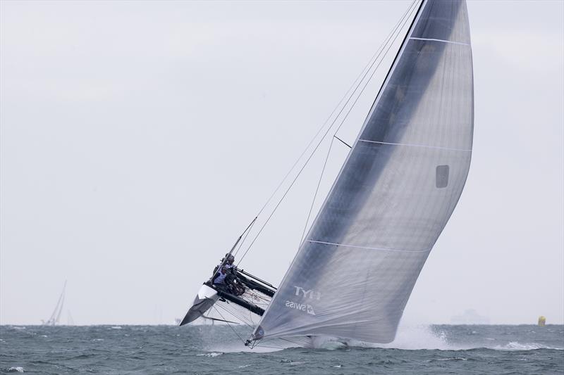 Ernesto Bertarelli's Alinghi comes off her foils on day 3 of GC32 Cowes Cup photo copyright Sander van der Borch taken at  and featuring the GC32 class