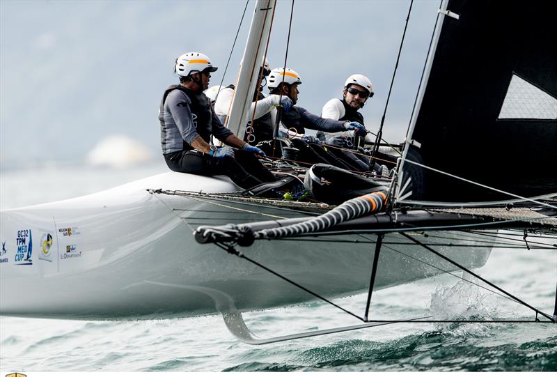 Seasoned GC32 owner-driver Jason Carroll at the helm of Argo on day 2 of the GC32 TPM Med Cup photo copyright Sailing Energy / GC32 Racing Tour taken at  and featuring the GC32 class