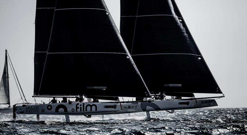 Simon Delzoppo's .film Racing neck and neck with Jason Carroll's Argo photo copyright Sailing Energy / GC32 Racing Tour taken at  and featuring the GC32 class