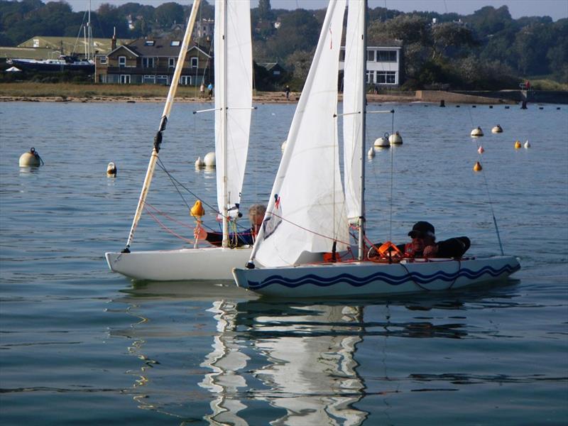 Race 3 finish during the Bembridge Illusion Picnic Hamper and Invitational photo copyright Mike Samuelson taken at Bembridge Sailing Club and featuring the Illusion class