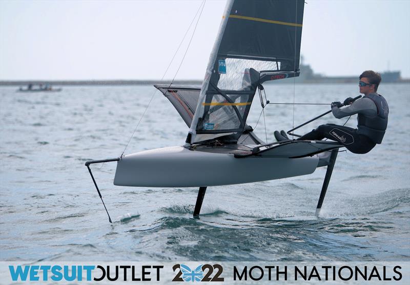 Nicolai Jacobsen finishes Race 13 on Day 4 of the 2022 Wetsuit Outlet UK Moth Class Nationals at the WPNSA photo copyright Mark Jardine / IMCA UK taken at Weymouth & Portland Sailing Academy and featuring the International Moth class