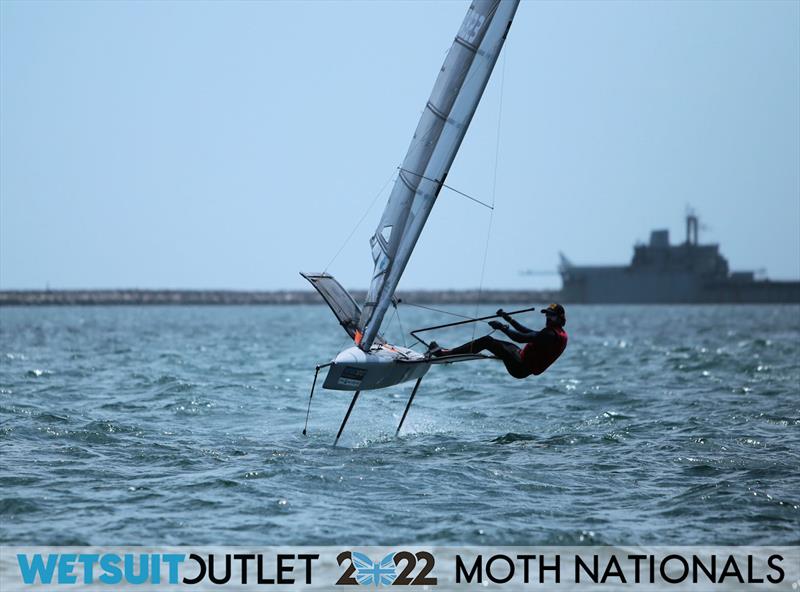 Brad Funk finishes Race 16 on Day 4 of the 2022 Wetsuit Outlet UK Moth Class Nationals at the WPNSA photo copyright Mark Jardine / IMCA UK taken at Weymouth & Portland Sailing Academy and featuring the International Moth class