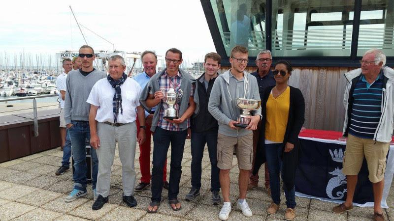 The crew of Columbus Circle receiving the winner's trophy for the RORC Cherbourg Race photo copyright Ant Davey / RORC taken at Royal Ocean Racing Club and featuring the IRC class