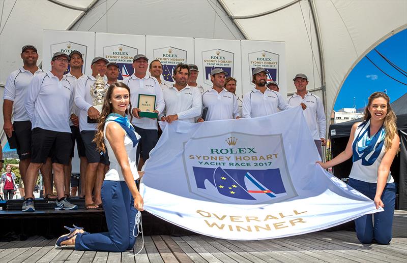 The Ichi Ban team with the trophy, winner's medals and winner's flag photo copyright Bow Caddy Media taken at Cruising Yacht Club of Australia and featuring the IRC class