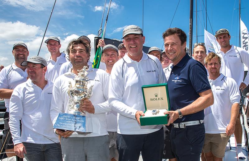 Patrick Boutellier hands the Rolex watch to Matt Allen aboard Ichi Ban photo copyright Bow Caddy Media taken at Cruising Yacht Club of Australia and featuring the IRC class