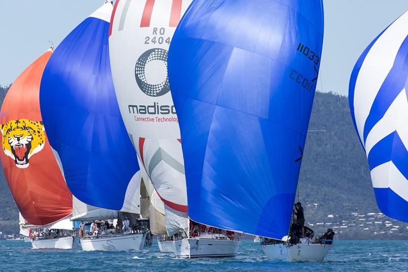 A spot of downwind competition - Airlie Beach Race Week 2019 photo copyright Andrea Francolini taken at Whitsunday Sailing Club and featuring the IRC class