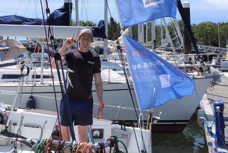 James Harayda on his Sunfast 3300 'Gentoo' celebrating winning 4 categories in the Myth of Malham Race as part of the UK Double Handed Offshore Series photo copyright Kate Cope taken at Royal Yacht Squadron and featuring the IRC class