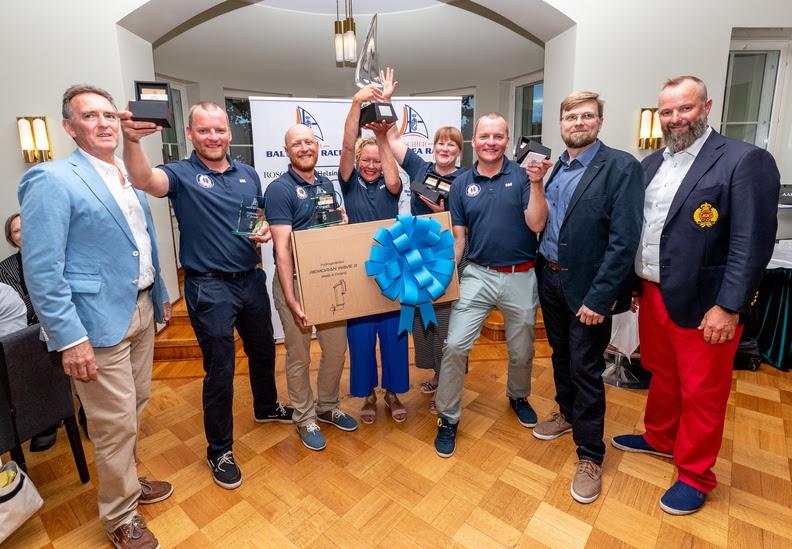 The jubliant crew of the Finnish H-323 Silver Moon II - first recipients of the Baltic Sea Race Trophy and a spoil of prizes, inc. a Remoran Wave 3 Hydrogenerator and gifts from Aarni photo copyright Pepe Korteniemi taken at Royal Ocean Racing Club and featuring the IRC class