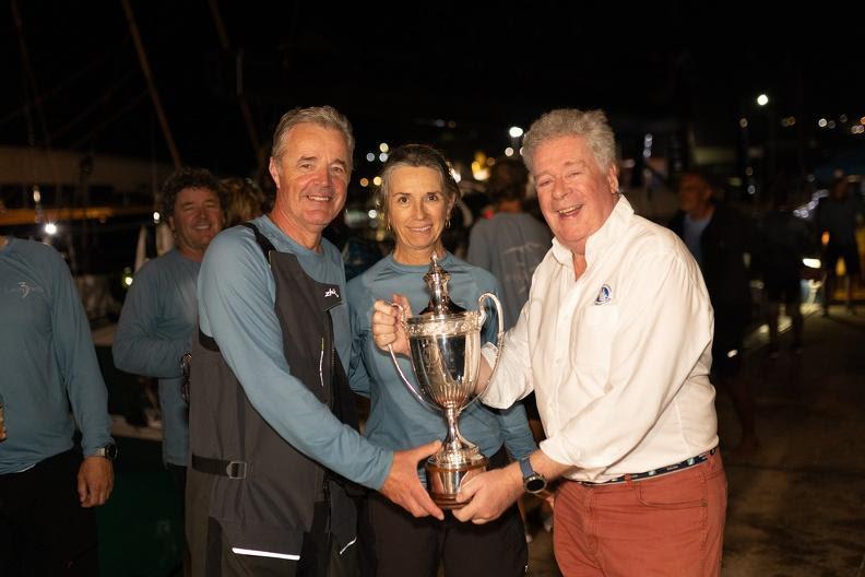 Andrew McIrvine, Secretary General of the International Maxi Association presents the IMA Transatlantic Trophy for Monohull Line Honours to the owners of Leopard 3 photo copyright Arthur Daniel / RORC taken at Royal Ocean Racing Club and featuring the IRC class