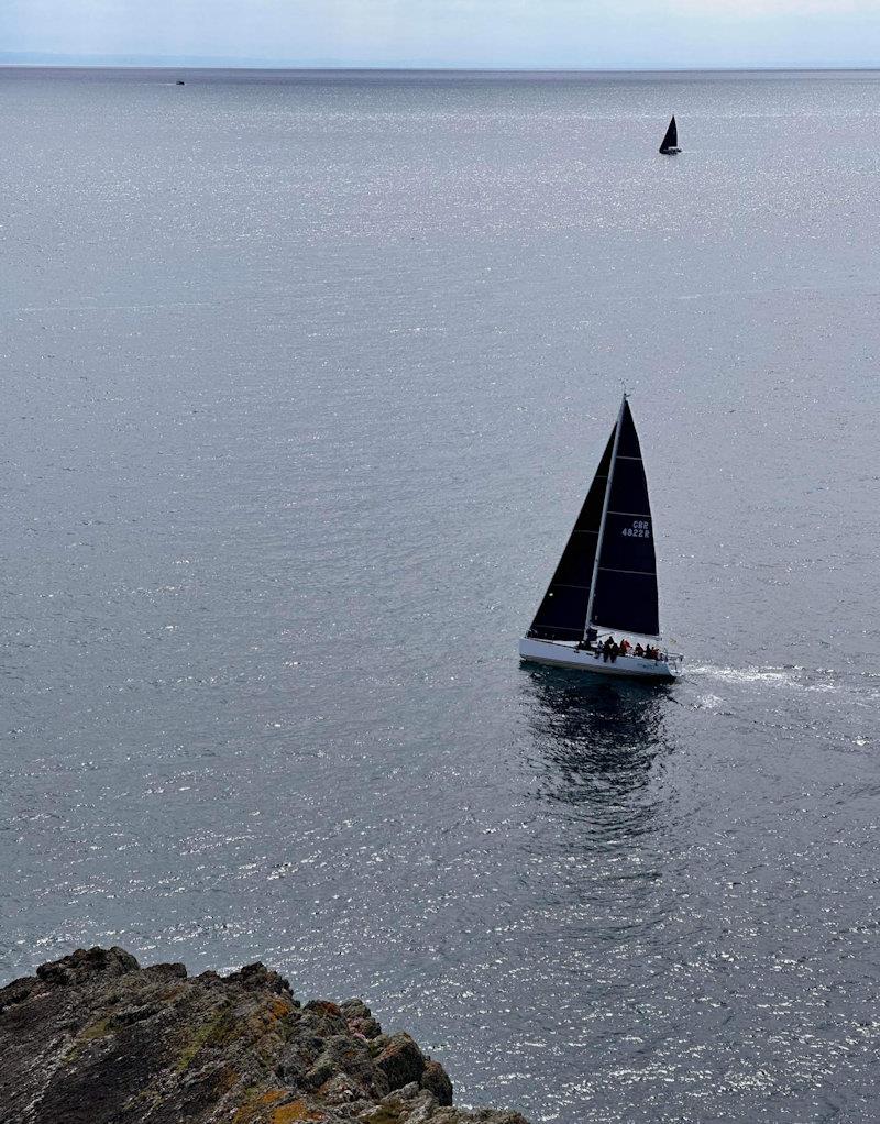 Mojito, tacking inshore to avoid the tide at Cilan Head, with Jackknife further out - 3rd Musto ISORA Welsh Coastal Race at Pwllheli photo copyright Ben Hudson taken at Pwllheli Sailing Club and featuring the IRC class